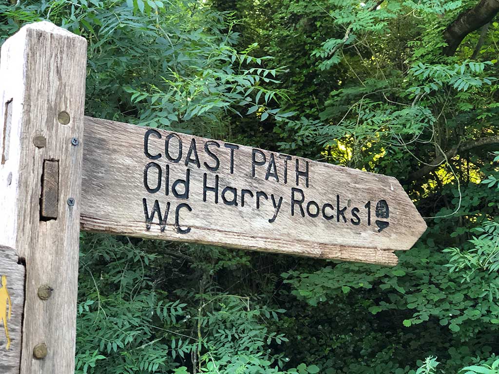 Signpost marking the start of the footpath to Old Harry Rocks