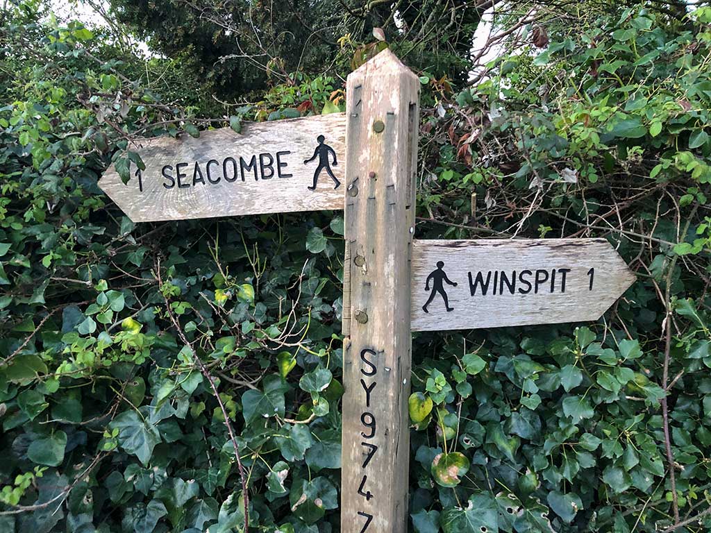 signpost to Winspit